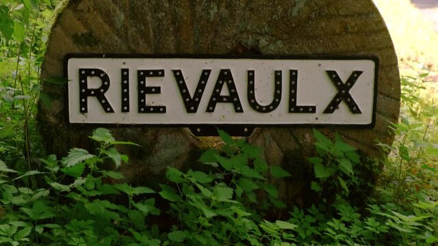Village sign of Rievaulx, home to Rievaulx Abbey in the North York Moors National Park, Yorkshire, England, UK, dating back to 1132