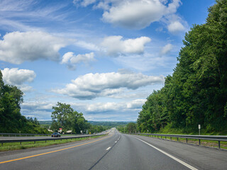 Classic Summer US Freeway View Going Downhill on a Cloudy Day in Upstate New York