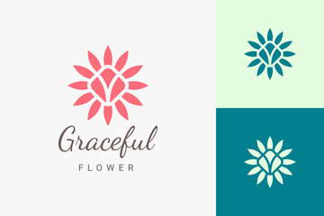 Beauty spa or yoga logo in flat and abstract flower logo