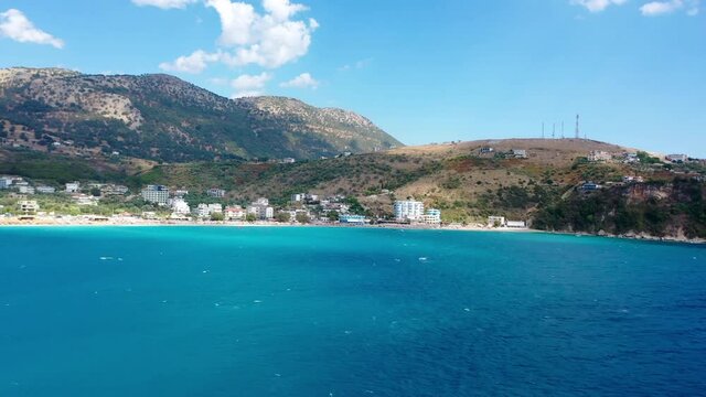 Birdseye view of Himara Beach and Adriatic Sea. Beautiful water Albania Riviera