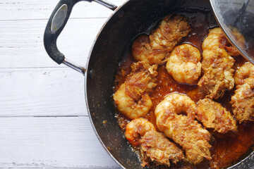 tasty fried king prawn in a plate on table 