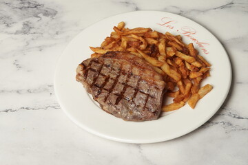 steak with French fries