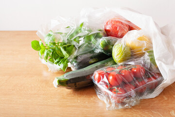 single use plastic waste issue. fruits and vegetables in plastic bags