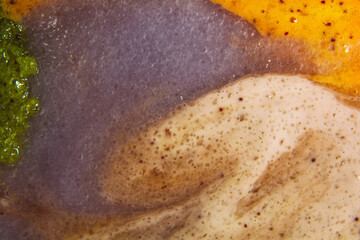 Obraz premium Set multicolored smears of scrub with exfoliating particles. Selfcare is a trendy procedure. Texture background