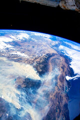 The California Wildfires Seen From Space. Digital Enhancement. Elements of this image furnished by NASA