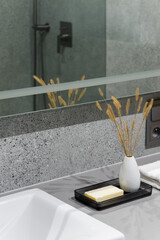 Soap bar and decorations in modern bathroom