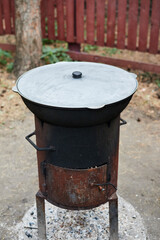 stove for a cast-iron cauldron for pilaf in nature