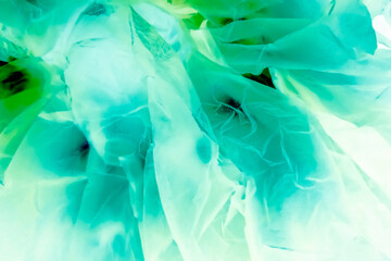 Abstract plastic bag texture background with a soft turquoise effect