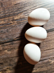 White chicken eggs. Eggs background. Chicken egg close-up.