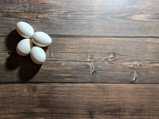 White chicken eggs. Eggs background. Chicken egg close-up.