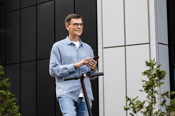 Senior using electric scooter for transportation in a modern city environment. Healthy senior lifestyle outdoors