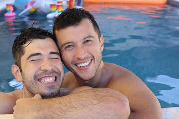 Gorgeous interracial gay couple in swimming pool 