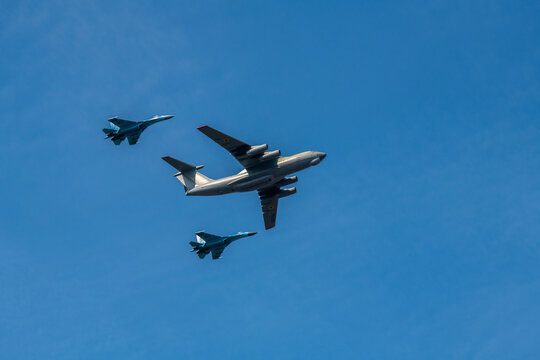 Group of aircrafts IL-76 flying in blue sky under the Kiev during the parade on the occasion of 30 years of independence of Ukraine, august 2021