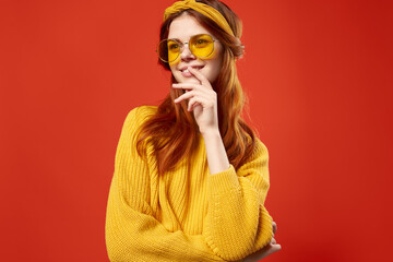 cheerful woman in yellow glasses fashion jewelry hippie