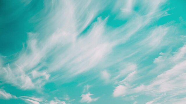 Fluffy Clouds Cloud Sky Blue Moving In Blue Cloudy Sky With Fluffy Clouds. Natural Background Cloudscape 4K Time Lapse, Timelapse, Time-lapse. 4K Blue Background. Abstract Blue. Cloud White Blue Sky