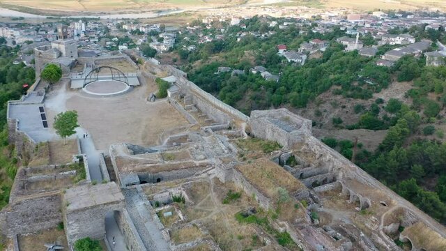 Castle of Gjirokastra and city center. Aerial view of ancient fortress Albania