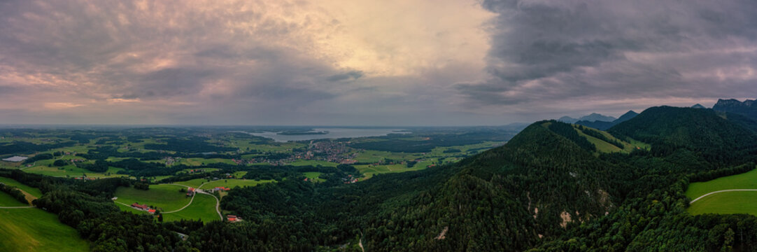Aerial view over the Chiemsee with the view to the big, idyllic bavarian lake and the view over Bernau am Chiemsee.