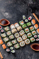 Sushi set isolated on black background. Photo for the menu and site. Top view. High quality photo