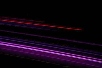 Night road lights. Lights of moving cars at night. long exposure multicolored