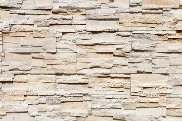 Concrete facade stone in beige color.
