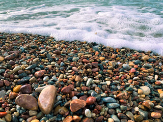 Sea pebbles background, natural colors