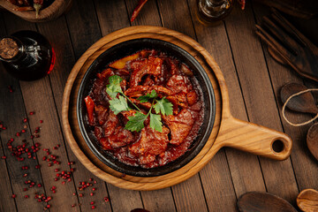 Pan of georgian lamb entrecotes in adjika sauce