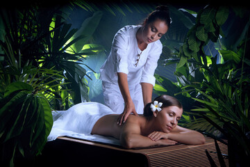 portrait of young beautiful woman in spa environment - 452740977