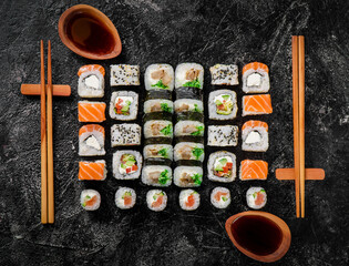 Sushi set isolated on black background. Photo for the menu and site. Top view. High quality photo