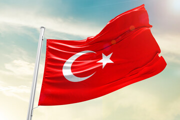 Turkey national flag waving in beautiful clouds.