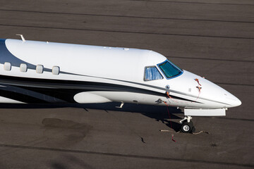 Modern business jet on the tarmac of an airport