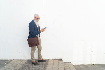 Senior man with a phone