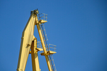 Fototapeta na wymiar yellow crane ladder