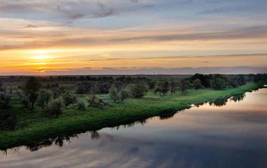 Foto op Canvas sunset over the river © Dmitriy Kravchenko