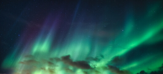 Fototapeta na wymiar Aurora Borealis, Northern Lights with starry in the night sky on Arctic Circle