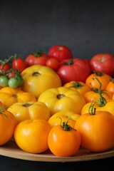 colorful tomatoes, yellow and red tomatoes, summer vegetables, tomatoes arranged in colors, tomatoes on a large plate
