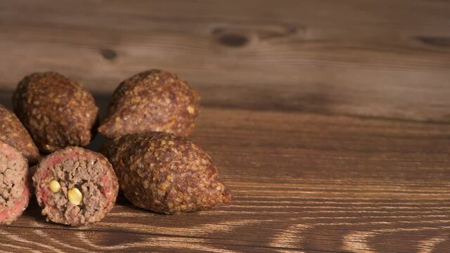 Traditional kebbe on turntable in lebanese restaurant, High quality 4k footage