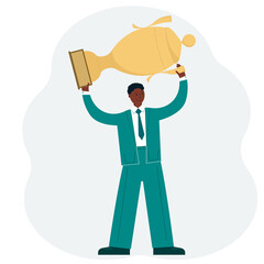 Business success concept. A man in a suit above his head holding a gold winner cup