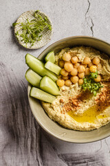 hummus with cucumber and sesame seeds