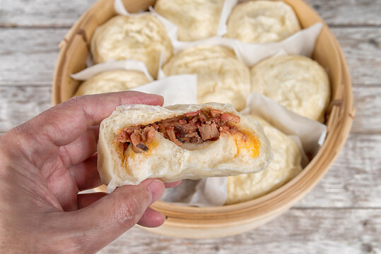Vietnamese Chinease steamed buns in a bamboo basket