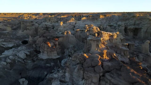Cinematic aerial shot of Valley of Dreams in Bisti De Na Zin Wilderness in New Mexico