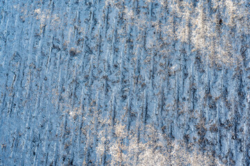 Top view of scarified and grooved concrete on a city road for overlay prep