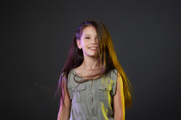 cute smiling little child girl with long hair
