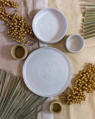 modern table setting with white ceramic tableware