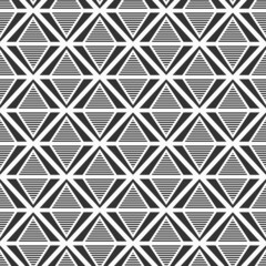 Abstract seamless pattern. Decorative geometric ornament of repeating striped triangles, pyramids. Modern stylish texture. Vector black and white background.
