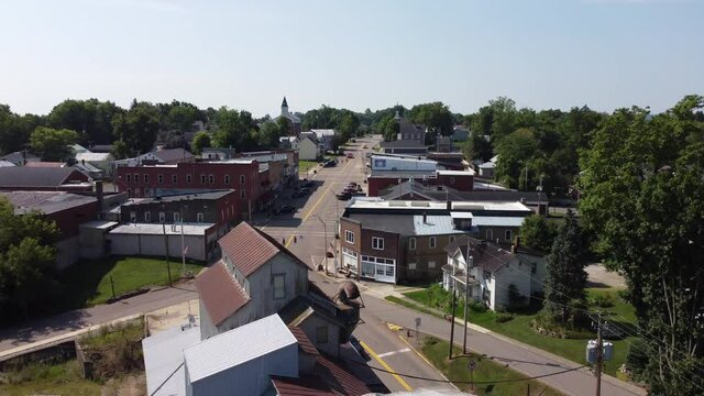 Pan over building and small midwest town 4k