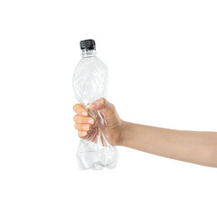Female hand clenching empty plastic bottle in the fist for recycling