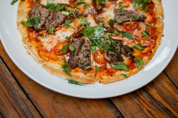 Pizza de carne y jitomate