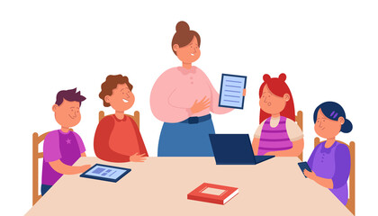 Cartoon teacher explaining task to children sitting at table. Flat vector illustration. Students learning, using gadgets, tablets and laptop in school lesson. Classroom, technology, education concept