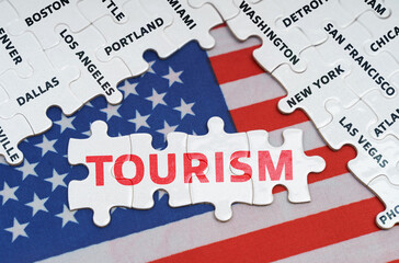 The USA flag has city name puzzles and puzzles with the inscription - tourism