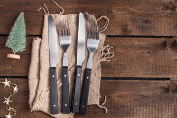 festive table setting christmas cutlery fork knife meal on the table copy space food background...
